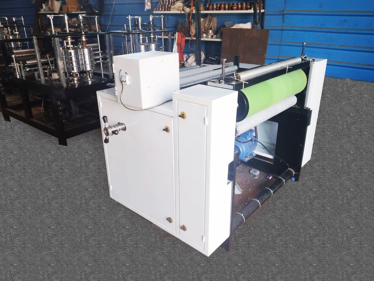 Toilet roll making machine